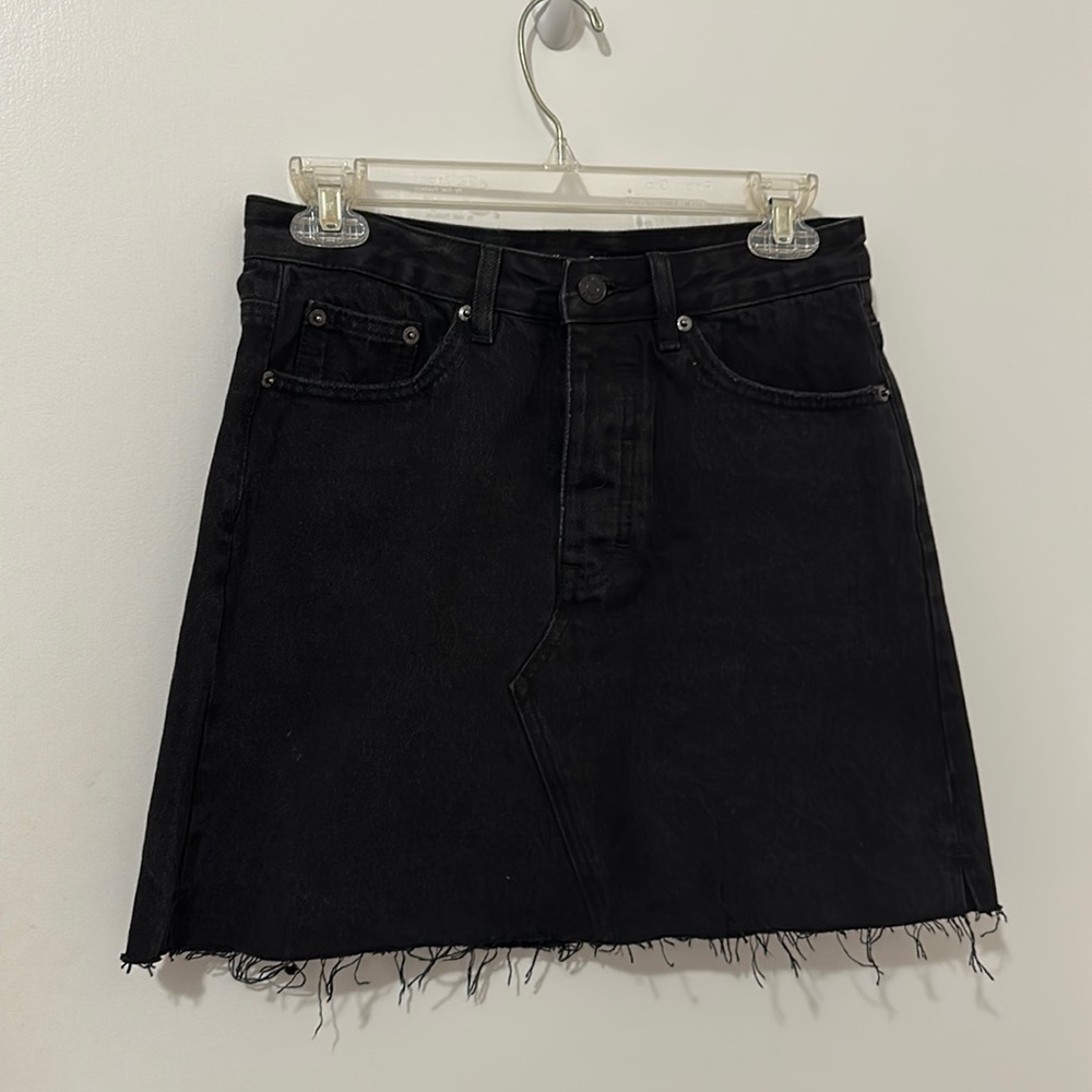 Black denim mini skirt! Hits about mid thigh